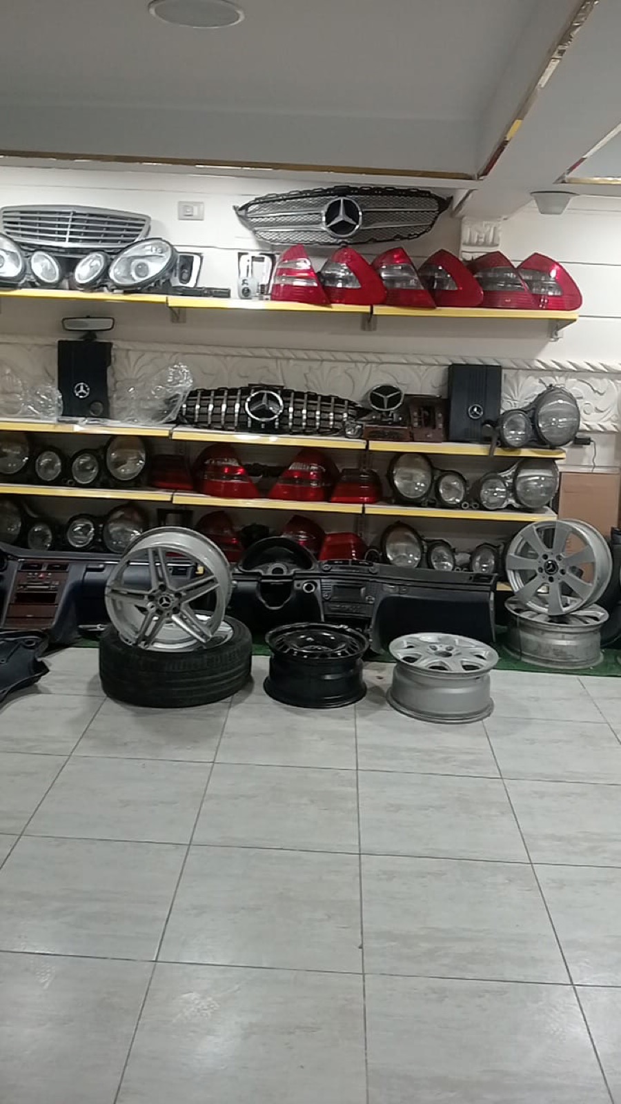 Mercedes alloy wheels and headlights arranged for customers